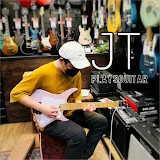 JT plays guitar