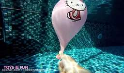 Hello Kitty Balloon Popping exploding in slow motion underwater. Hello Kitty balonu patlıyor