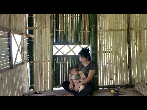 A single mother alone with her small child completely designed a bamboo house